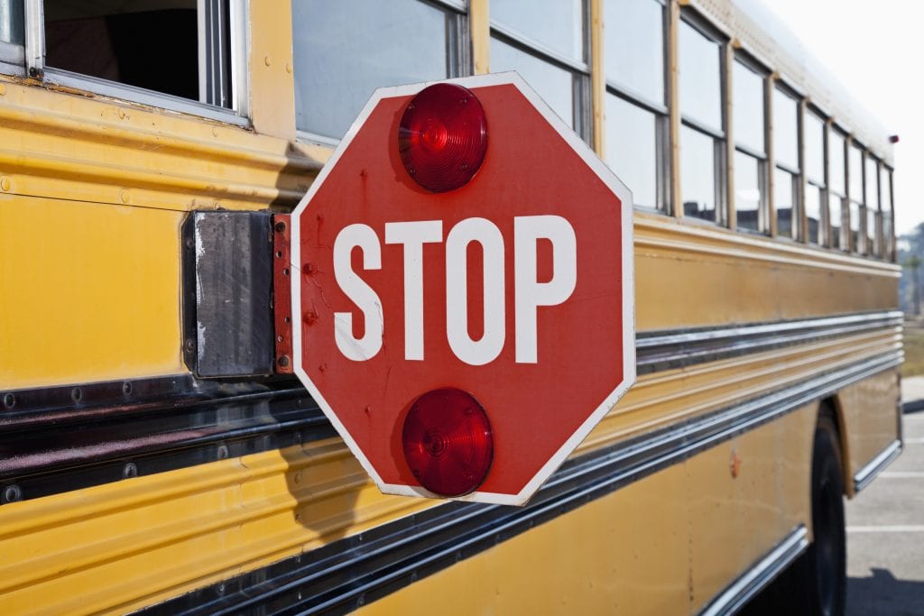 West Virginia School bus with stop sign extended to prevent accidents