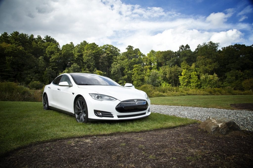 White Tesla with autopilot features that are under fresh scrutiny after recent crashes