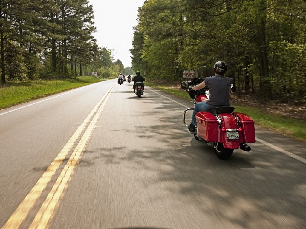 West Virginia motorcycle riders on a rural road.